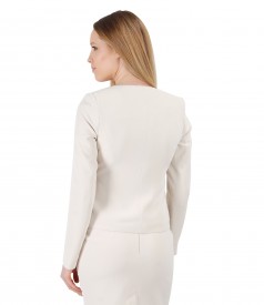 Cream jacket with accessory brooch