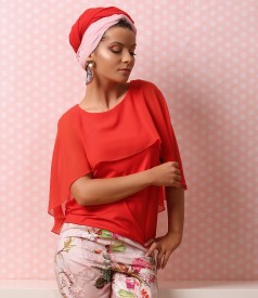 Elegant blouse with veil cape and button on the back