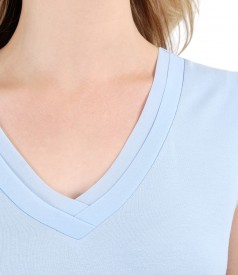 Elastic jersey blouse with trim and veil fins