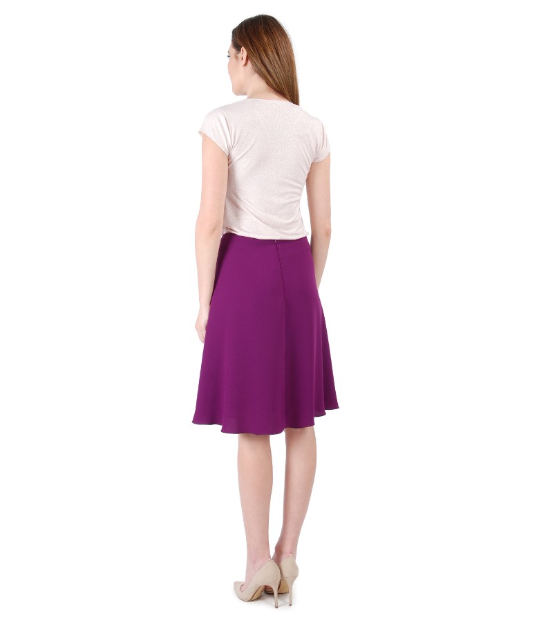 Elegant outfit with blouse with folds and skirt