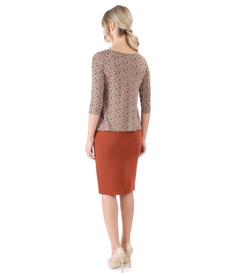 Office outfit with tapered skirt and jerse blouse with decorative flaps