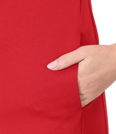 Midi dress made of thick elastic jersey with side pockets