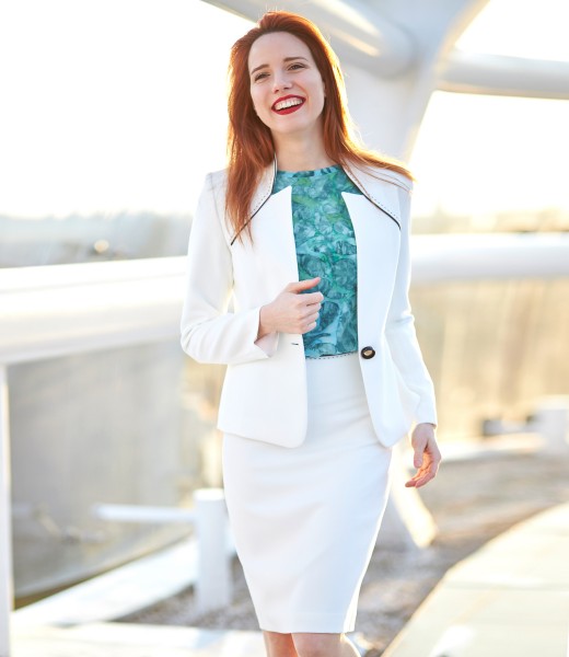 Office woman suit with jacket and skirt made of white elastic fabric