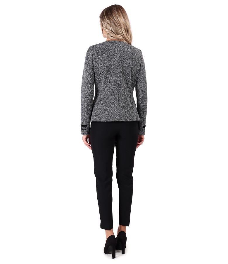 Office outfit with ankle pants and jacket with trimmings on the sleeves
