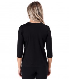 Elastic jersey blouse with rips at the decolletage and sleeve