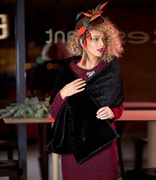 Elegant outfit with ecological fur shawl and curly suit