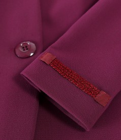 Elastic fabric jacket with trimmings at the ends