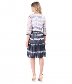 Dress with ruffles made of printed veil