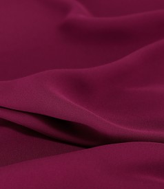 Blouse with folds on decolletage embellished with crystals