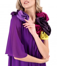Elegant dress made of veil with satin flowers at the neckline