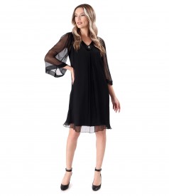 Dress made of natural silk voile with removable brooch