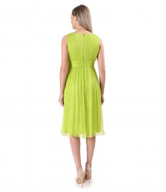 Natural silk voile evening dress with brooch
