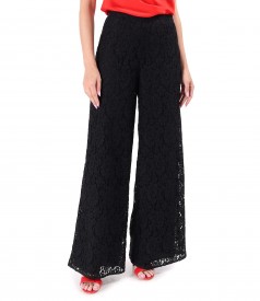 Wide-leg pants made of cotton lace with floral motifs