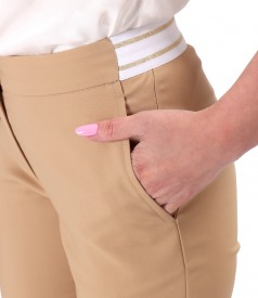 Elastic cotton pants with front pockets