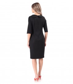 Elegant dress made of fabric with shiny applications