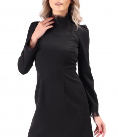 Short cocktail dress made of fabric with shiny applications