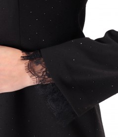 Short cocktail dress made of fabric with shiny applications