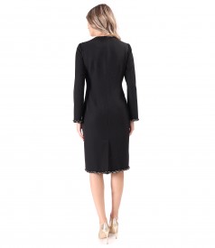 Elegant fabric dress with shiny appliqus and decorative chain