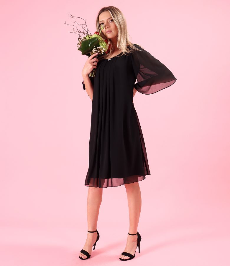 Elegant dress made of veil with flared sleeves