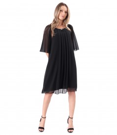 Elegant dress made of veil with flared sleeves