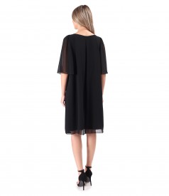 Elegant dress made of veil with flared sleeves