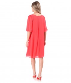 Elegant dress made of veil with flared sleeves
