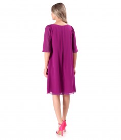 Elegant dress made of veil with flared sleeves