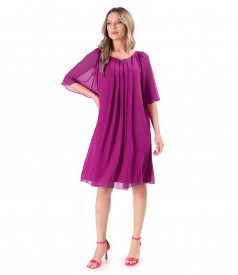 Elegant dress made of veil with flared sleeves