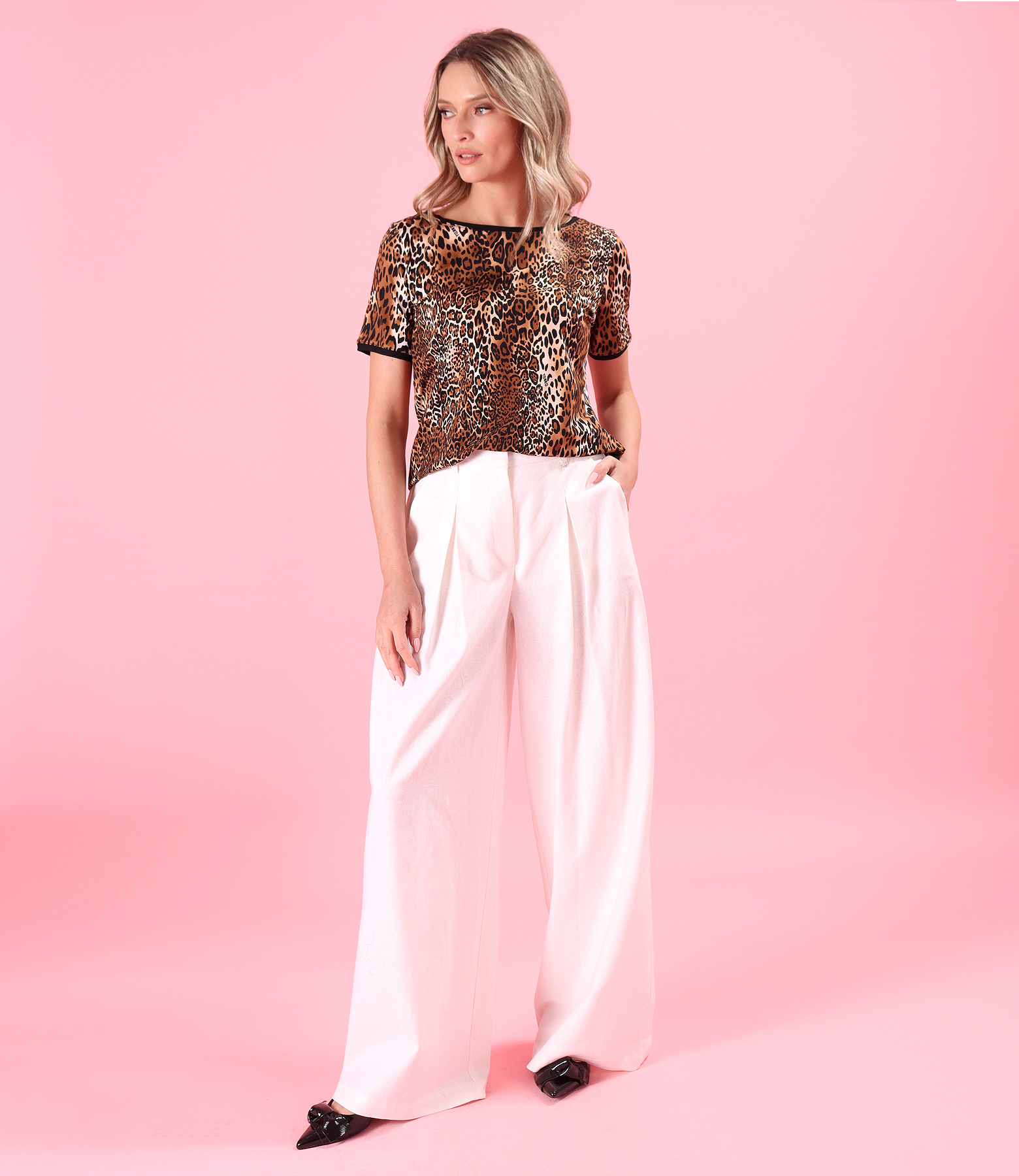 Casual outfit with wide pants and animal print blouse