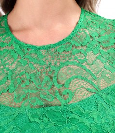 Elegant dress made of lace with floral motifs