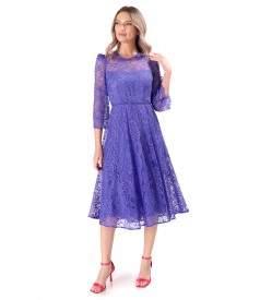 Elegant dress made of lace with floral motifs
