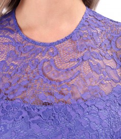 Elegant dress made of lace with floral motifs