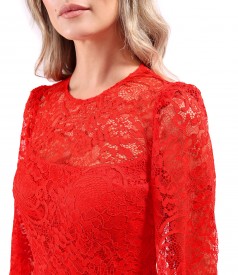 Elegant dress made of lace with floral motifs