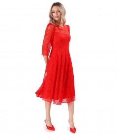 Elegant dress made of lace with floral motifs