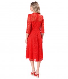 Elegant dress made of lace with floral motifs