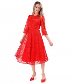 Elegant dress made of lace with floral motifs