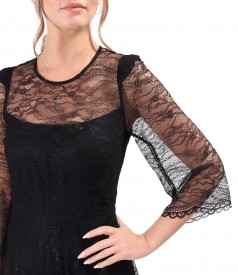 Elegant dress made of lace with floral motifs