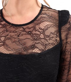 Elegant dress made of lace with floral motifs