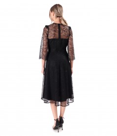 Elegant dress made of lace with floral motifs