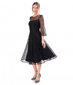 Elegant dress made of lace with floral motifs