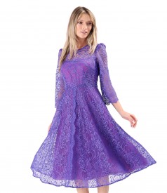 Elegant dress made of lace with floral motifs