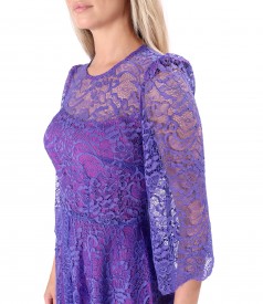 Elegant dress made of lace with floral motifs