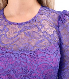 Elegant dress made of lace with floral motifs