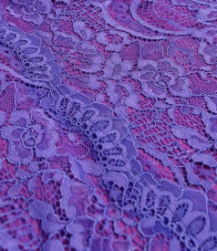 Elegant dress made of lace with floral motifs