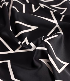 Satin dress printed with geometric motifs