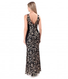 Long evening dress made of gold sequins with floral motifs