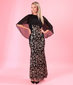 Evening outfit with sequin dress and veil cape