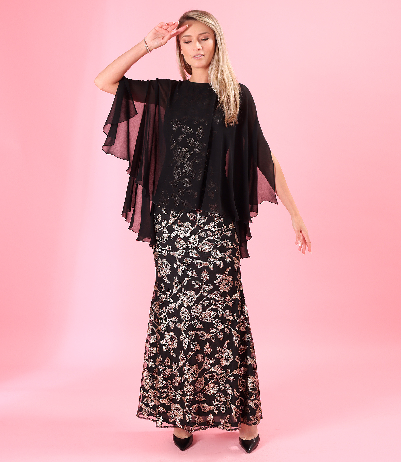 Sequined evening dress and veil cape