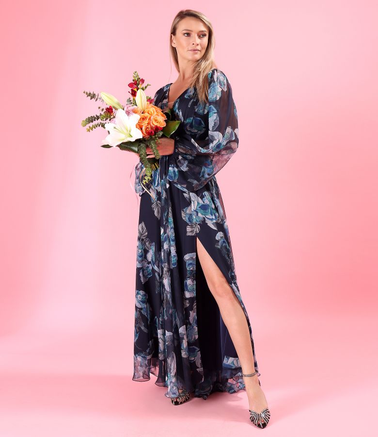 Long evening dress made of veil printed with floral motifs