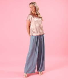 Elegant outfit with loose pants and satin viscose blouse